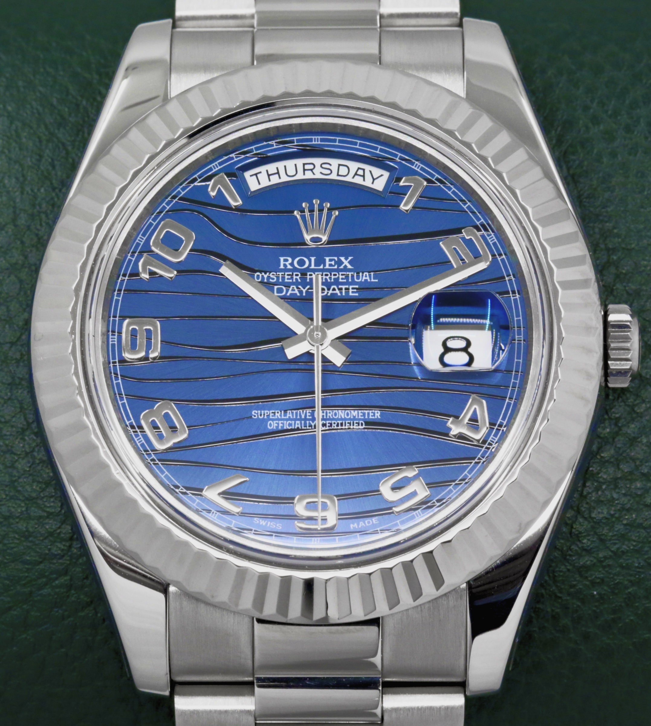 Rolex Day-Date II, 41mm 18ct White Gold Case, Fluted Bezel, with Blue Wave Dial with Concentric 18ct White Gold Arab Numerals, on 18ct White Gold Rolex President Bracelet, Ref. 218239, Circa: 2008, with Box, Books, Rolex Warranty Card & Balance of 2 Year Rolex Service Warranty