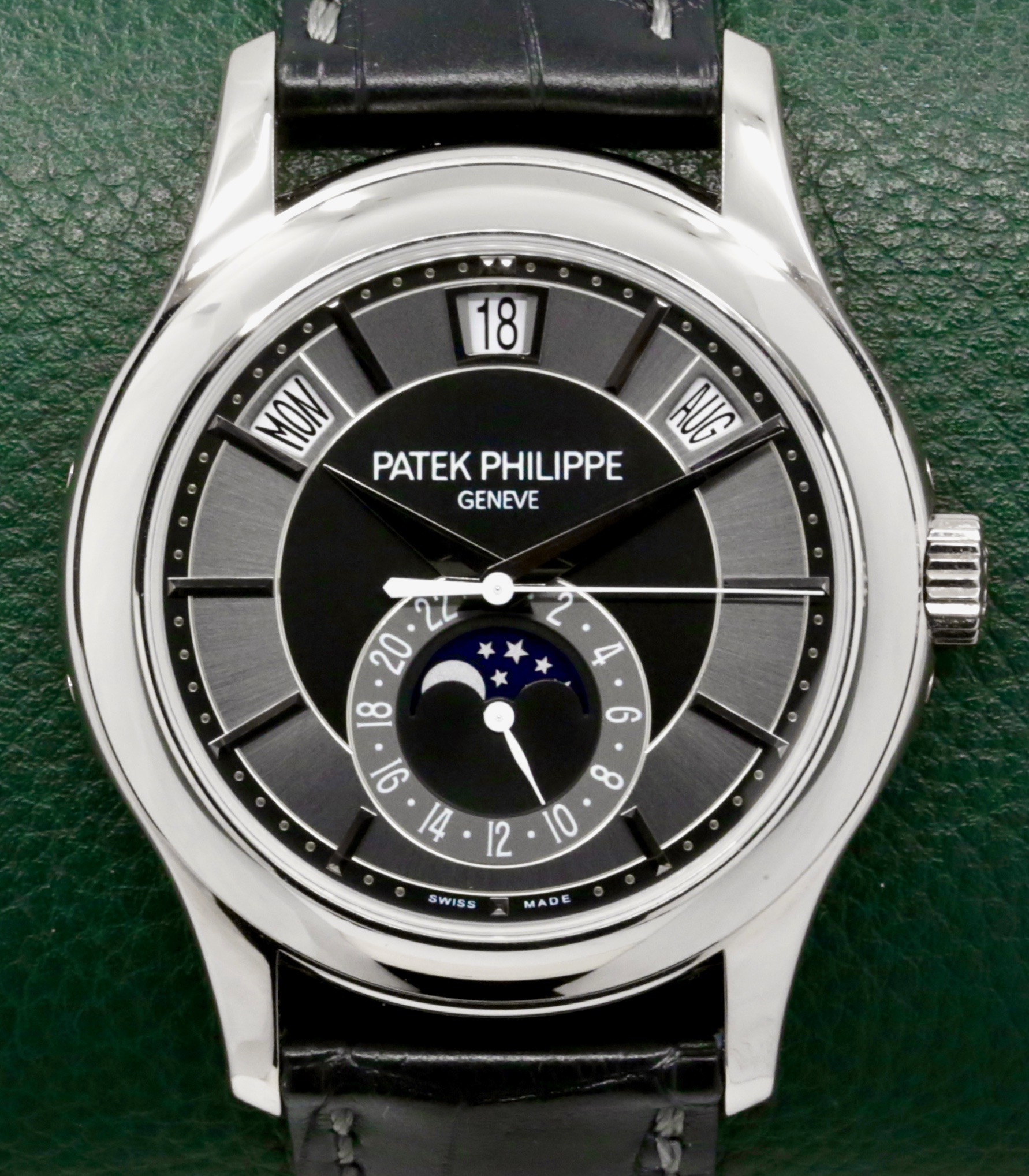 Patek Philippe Ref. 5205G-010 Annual Calendar, in 18ct White Gold, with Grey & Black Index Dial, Day, Date, Month, & Moon Phase Display, on Black Patek Philippe Alligator Strap with 18ct White Gold Patek Philippe Tang Buckle, Sold New in 2012, with Box & Papers