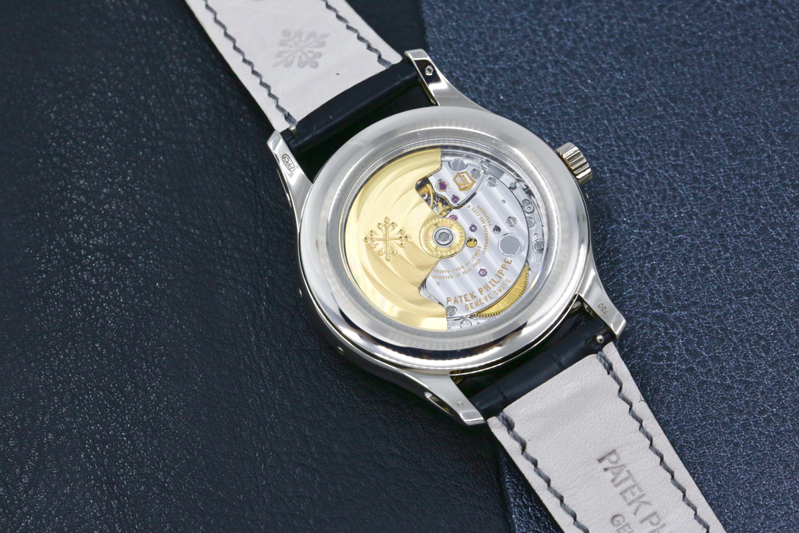 Patek Philippe Ref. 5205G-010 Annual Calendar, in 18ct White Gold, with Grey & Black Index Dial, Day, Date, Month, & Moon Phase Display, on Black Patek Philippe Alligator Strap with 18ct White Gold Patek Philippe Tang Buckle, Sold New in 2012, with Box & Papers - Image 6