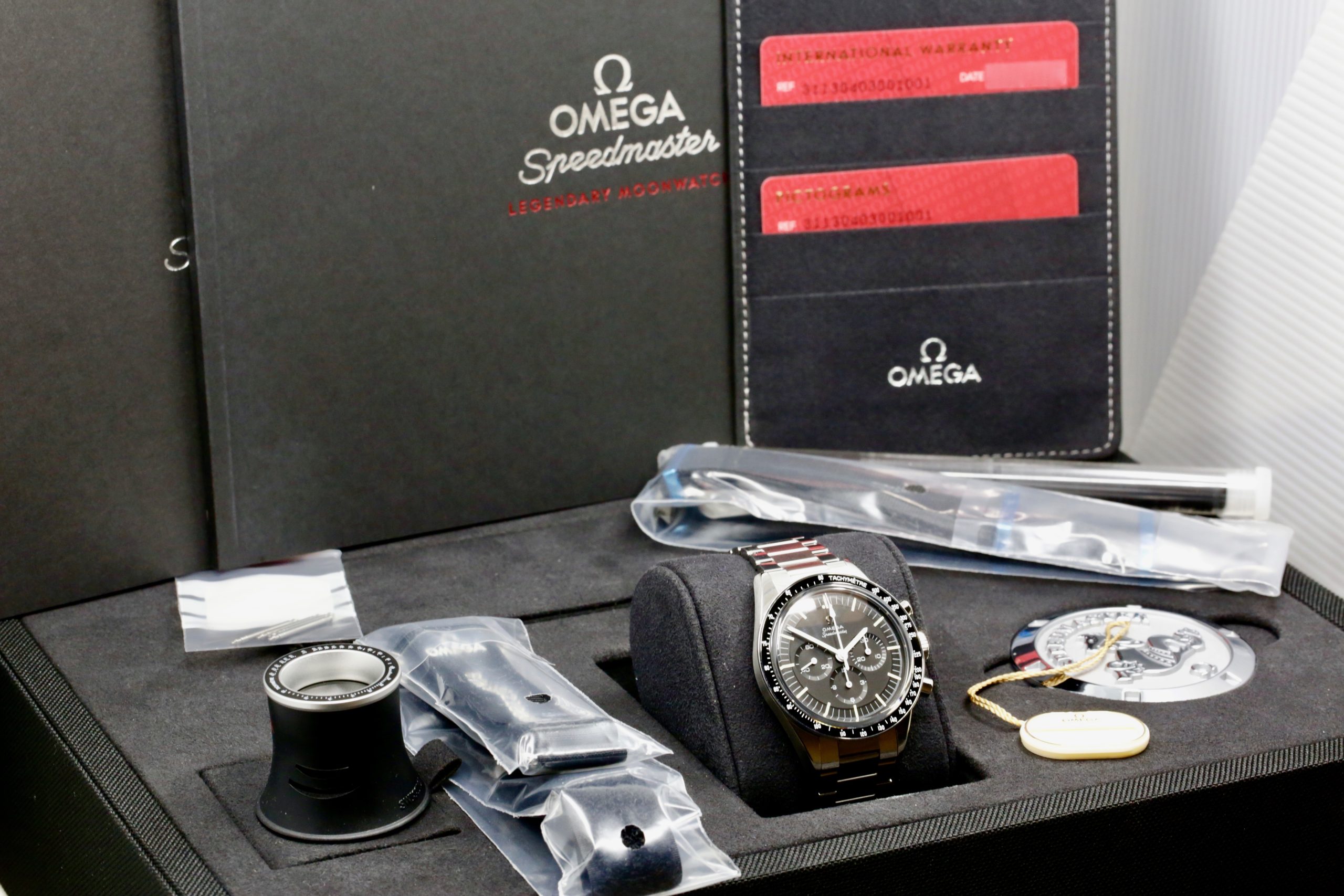Omega Speedmaster "Ed White" Calibre 321, Stainless Steel, 39.7mm Case, Black Index Dial, on Stainless Steel Omega Bracelet, Ref. 311.30.40.30.01.001 , Circa: 2021, Complete with Big Box, Books, & Omega Warranty Cards - Image 10