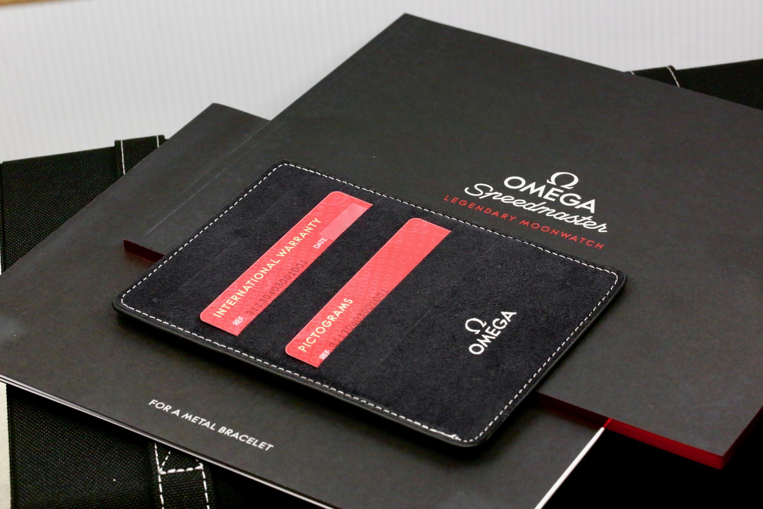 Omega Speedmaster "Ed White" Calibre 321, Stainless Steel, 39.7mm Case, Black Index Dial, on Stainless Steel Omega Bracelet, Ref. 311.30.40.30.01.001 , Circa: 2021, Complete with Big Box, Books, & Omega Warranty Cards - Image 11