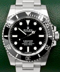 Rolex Submariner Non-Date, 40mm, Stainless Steel, Black Ceramic Bezel, Black Index Dial, on Stainless Steel Rolex Oyster Bracelet, Ref. 114060, Circa: 2018, Complete with Box, Books, Green & White Swing Tags, Bezel Protector, and Rolex Warranty Card