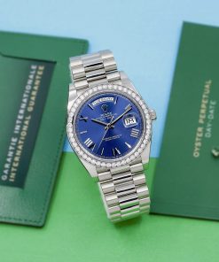 Alternative view of Rolex Day-Date 40, in 18ct White Gold, with Factory Set Diamond Bezel, Blue Roman Dial, on 18ct White Gold Rolex President Bracelet, Ref. 228349RBR, Circa: 2021, with Box, Books, Green & White Swing Tags, & Rolex Warranty Card