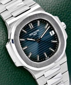 Patek Philippe Nautilus Ref. 5800/1A-001, in Stainless Steel, Blue Index Dial with Date, on an Integrated Stainless Steel Patek Philippe Bracelet, Circa: 2006, with Box & Papers