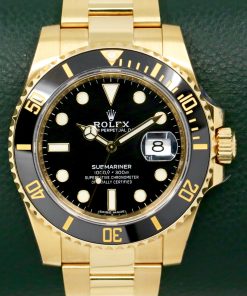 Rolex Submariner Date, in 18ct Yellow Gold, Black Ceramic Bezel, Black Index Dial, on a Rolex 18ct Yellow Gold Rolex Oyster Bracelet, Ref. 116618LN, Circa: 2017, with Rolex Box, Books, Rolex Warranty, Rolex Service Card & Balance of 2 Year Rolex Service Warranty