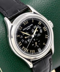 Patek Philippe Annual Calendar, Ref. 5035P, 37mm Platinum Case (0.950PT), Black Roman Dial with Day, Month, Subsidiary Second & Date Display, on Black Patek Philippe Alligator Strap with Platinum Patek Tang Buckle, with Patek Philippe Archive Certificate