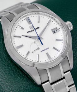 Grand Seiko "Snowflake" Heritage Collection, Automatic Spring Drive 3-Day, Titanium Case, White Index Dial with Date & Power Reserve Display, on Titanium Grand Seiko Bracelet, Ref. SBGA211, Circa: 2023, Complete with Box, Books, Grand Seiko Warranty Card & Balance of 5 Year Grand Seiko Factory Warranty
