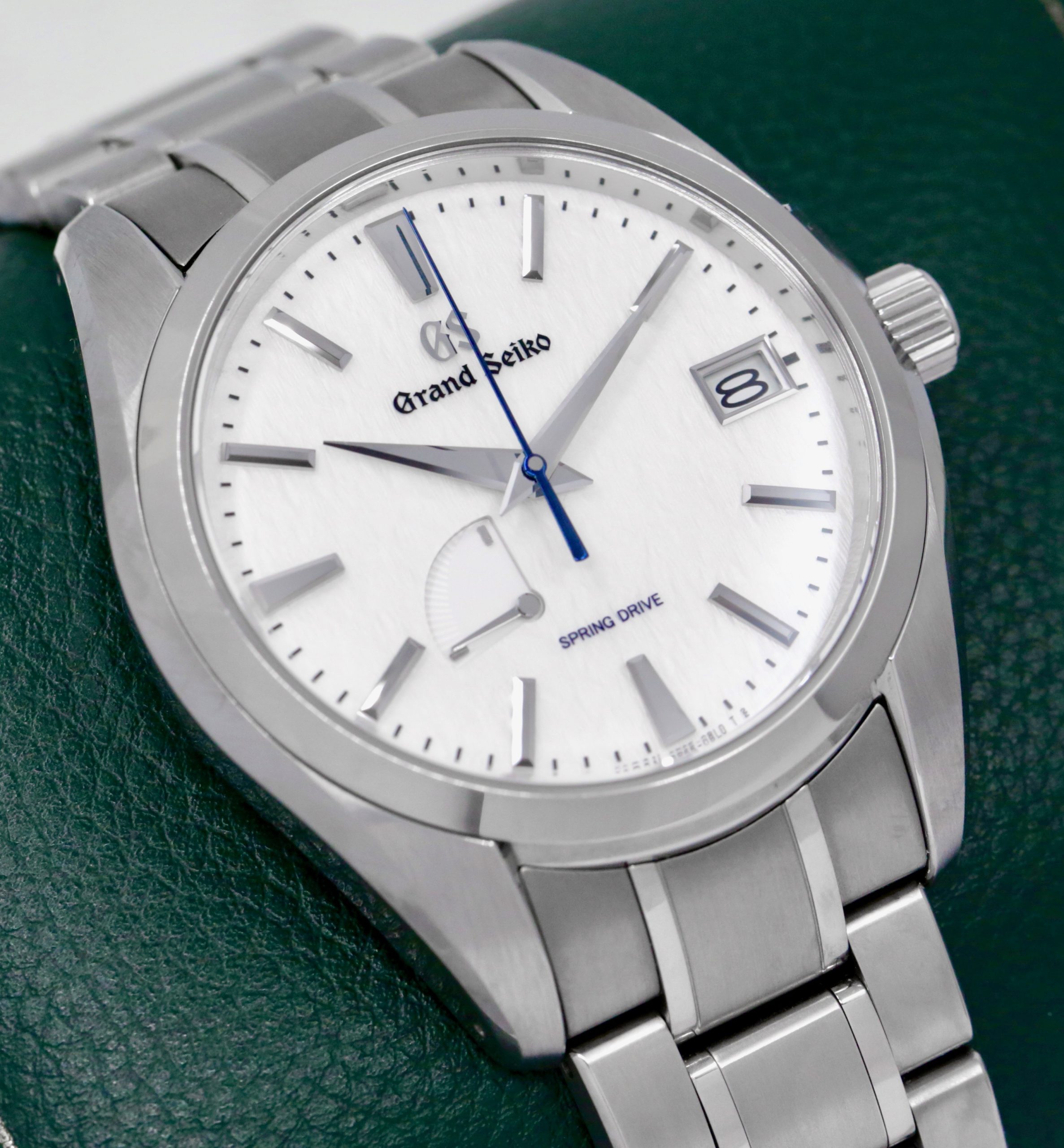 Grand Seiko "Snowflake" Heritage Collection, Automatic Spring Drive 3-Day, Titanium Case, White Index Dial with Date & Power Reserve Display, on Titanium Grand Seiko Bracelet, Ref. SBGA211, Circa: 2023, Complete with Box, Books, Grand Seiko Warranty Card & Balance of 5 Year Grand Seiko Factory Warranty