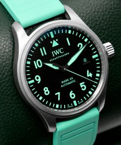 Alternative view of IWC Pilot's Mark XX "Mercedes-AMG Petronas Formula One Team" Edition, 40mm Titanium Case, Black Dial with Teal Arab Numerals, on Teal IWC Rubber Strap with Titanium IWC Tang Buckle, Ref. IW328210, Circa: 2025, Complete with Box & Papers