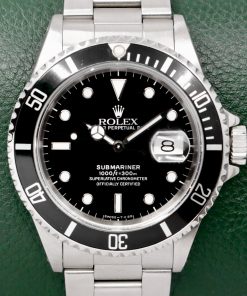 Rolex Submariner Date, in Stainless Steel, Black "Swiss - T < 25" Dial, Black Aluminium Bezel, on Stainless Steel Rolex Oyster Bracelet, Ref. 16610, Circa: 1991, with Rolex Box