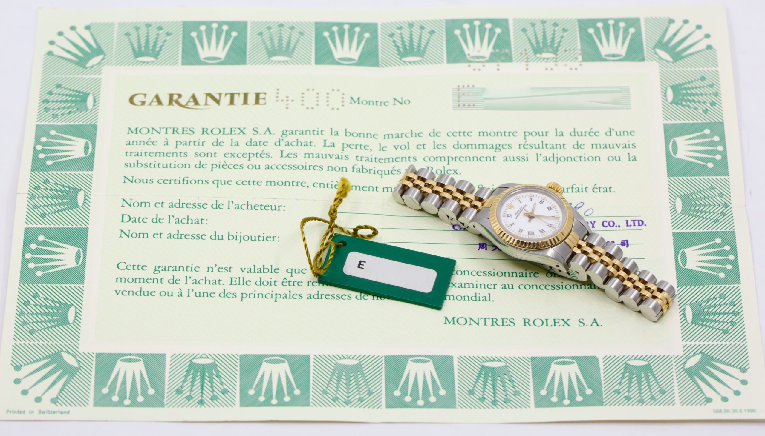 Rolex Oyster Perpetual 24mm in Stainless Steel and 18ct Yellow Gold, 18ct Yellow Gold Fluted Bezel, White Roman Dial on a Rolex Jubilee Bracelet. Ref. 67193, Circa 1990 with Box, Books, Swing Tag, Rolex Folder and Rolex Warranty Certificate - $6,950 inc GST!! - Image 8