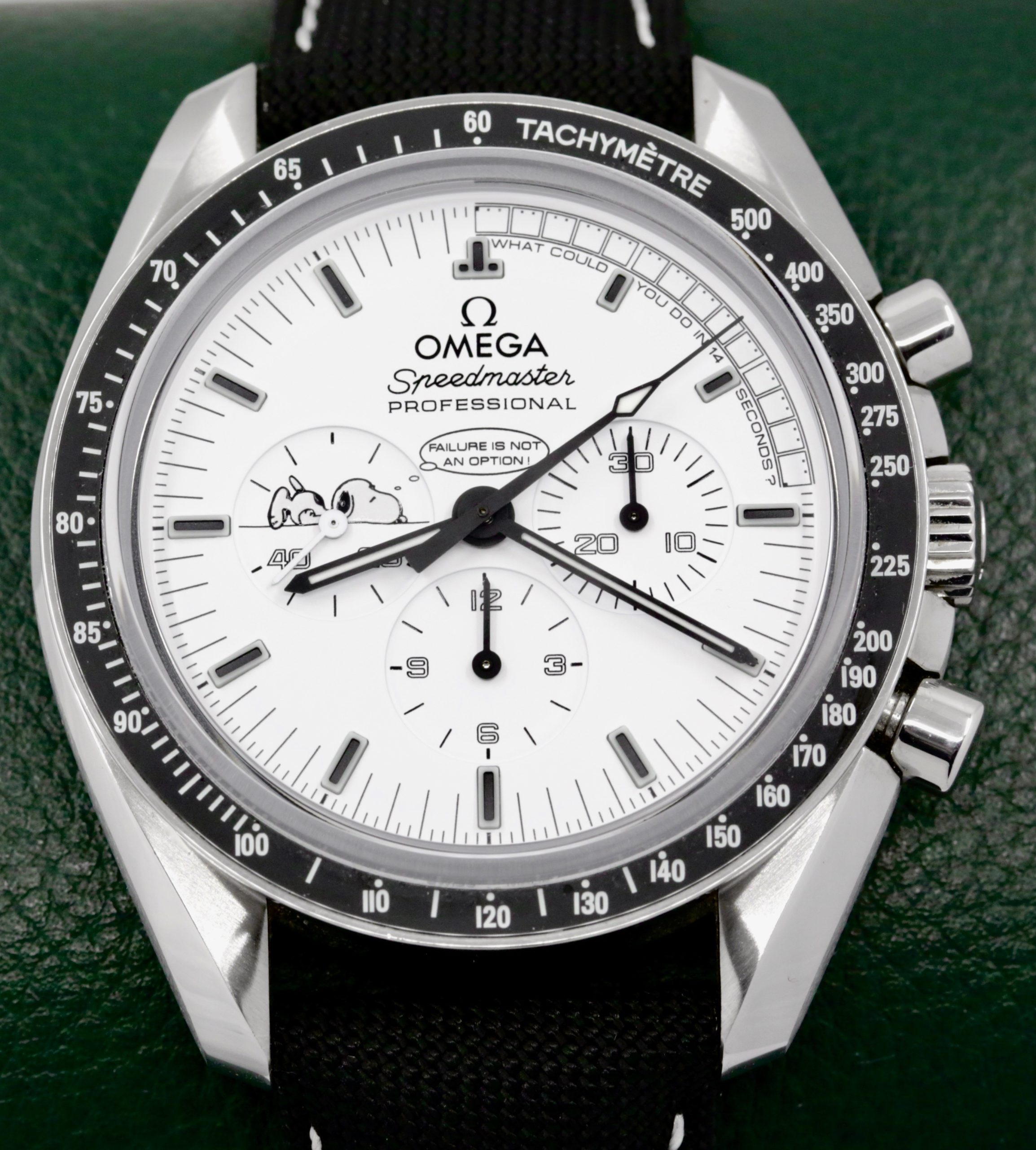 Omega Speedmaster Professional "Silver Snoopy Award" 45th Anniversary of Apollo 13, Stainless Steel Case, White Index Dial, on Omega Composite Fabric Strap with Stainless Steel Omega Deployant, Ref. 311.32.42.30.04.003, Circa: 2016, Complete with Box, Books & Omega Warranty Cards
