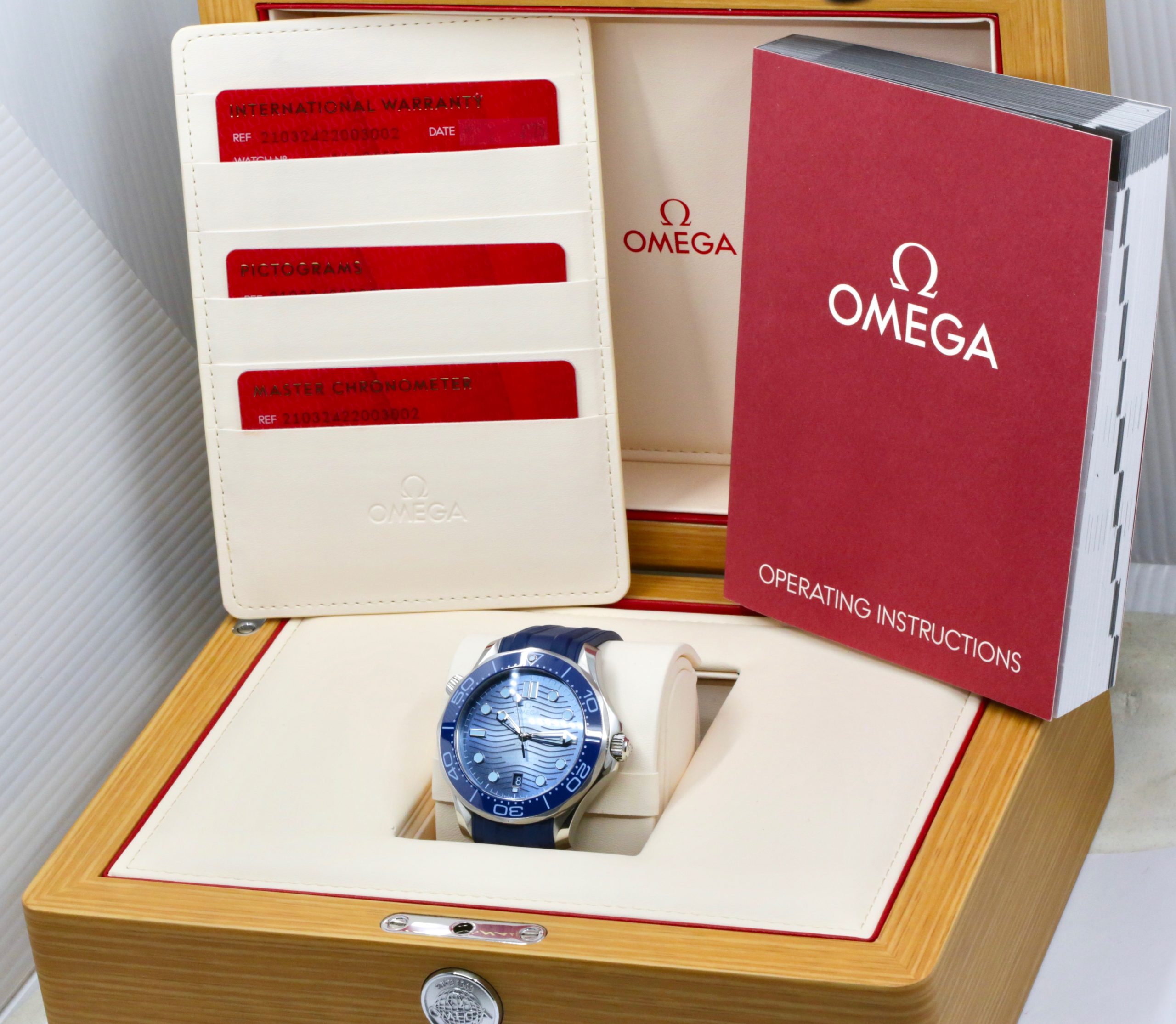 Omega Seamaster 300M "Summer Blue", Stainless Steel Case, Blue Ceramic Bezel, Blue Wave Dial, on Blue Omega Rubber Strap with Omega Stainless Steel Tang Buckle, Ref. 210.32.42.20.03.002, Circa: 2025, Complete with Box, Book, Omega Warranty Cards & Balance of 5 Year Omega Factory Warranty *MINT CONDITION! - $7,500 inc GST!!! - Image 8