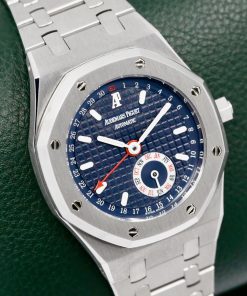 Audemars Piguet Royal Oak Annual Calendar, 36mm Stainless Steel Case, with Blue "Tapisserie" Dial with Month Sub-Dial & Pointer Date, on Stainless Steel Audemars Piguet Royal Oak Bracelet, Ref. 25920ST, Circa: 1999, with Audemars Piguet Box, Stylus Tool, & Book