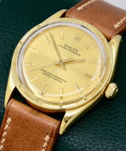 Alternative view of Rolex Oyster Perpetual in 18ct Yellow Gold, 18ct Engine Turned Bezel, Champagne Index Dial, on Tan Artisan Leather Strap. Ref. 1007, Circa 1960’s - $8,800 inc GST!!