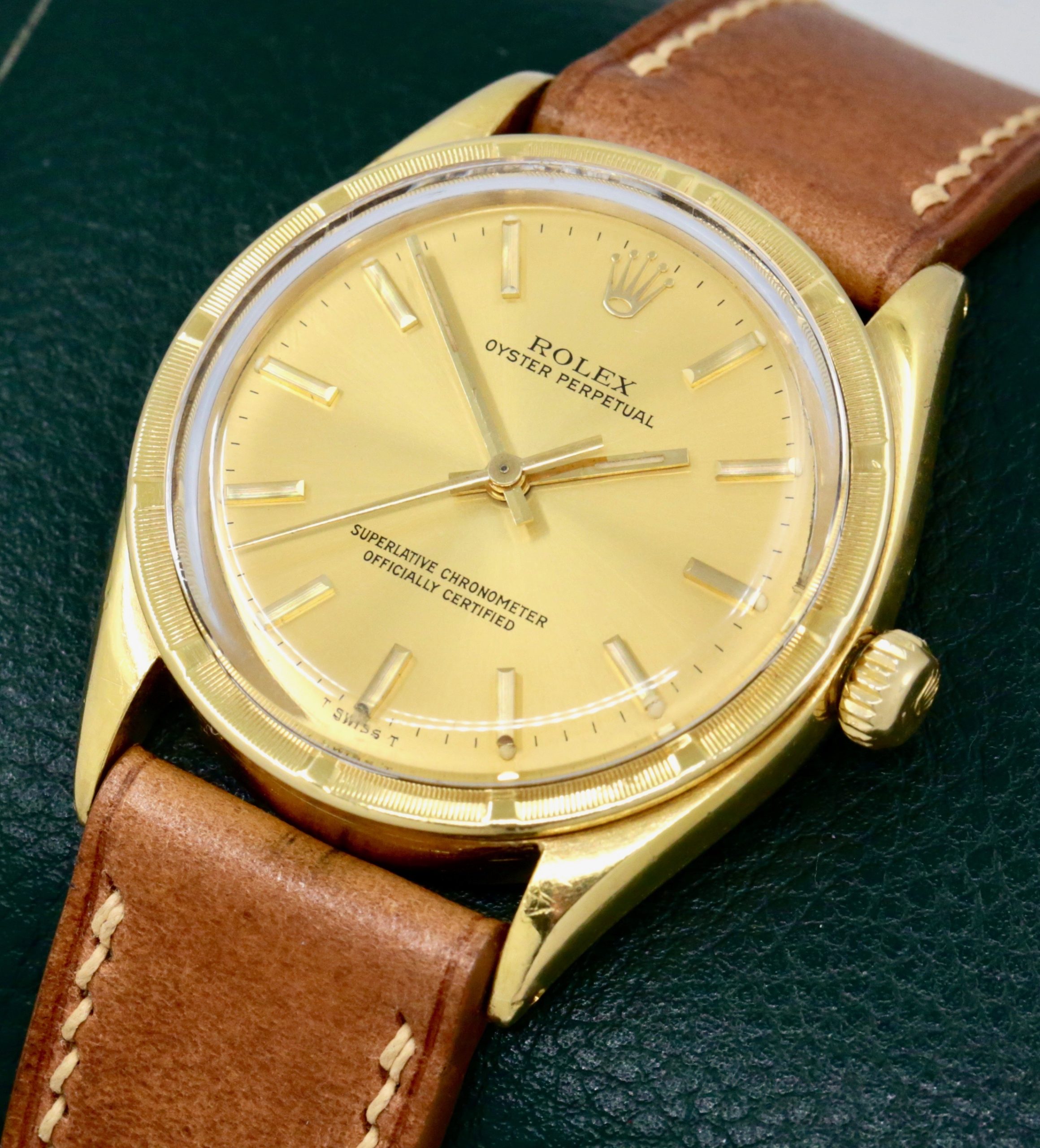 Rolex Oyster Perpetual in 18ct Yellow Gold, 18ct Engine Turned Bezel, Champagne Index Dial, on Tan Artisan Leather Strap. Ref. 1007, Circa 1960’s - $8,800 inc GST!! - Image 2