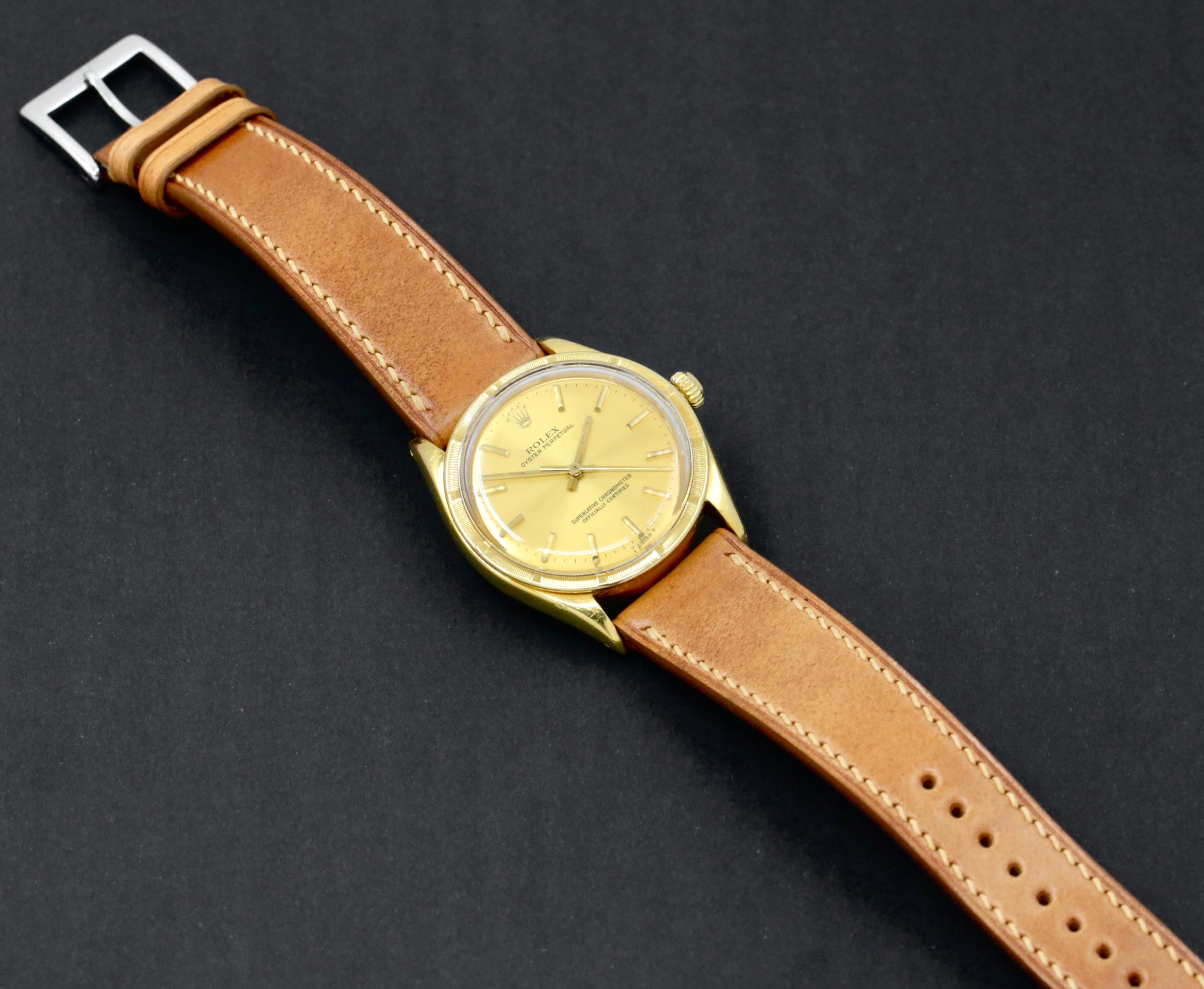 Rolex Oyster Perpetual in 18ct Yellow Gold, 18ct Engine Turned Bezel, Champagne Index Dial, on Tan Artisan Leather Strap. Ref. 1007, Circa 1960’s - $8,800 inc GST!! - Image 6