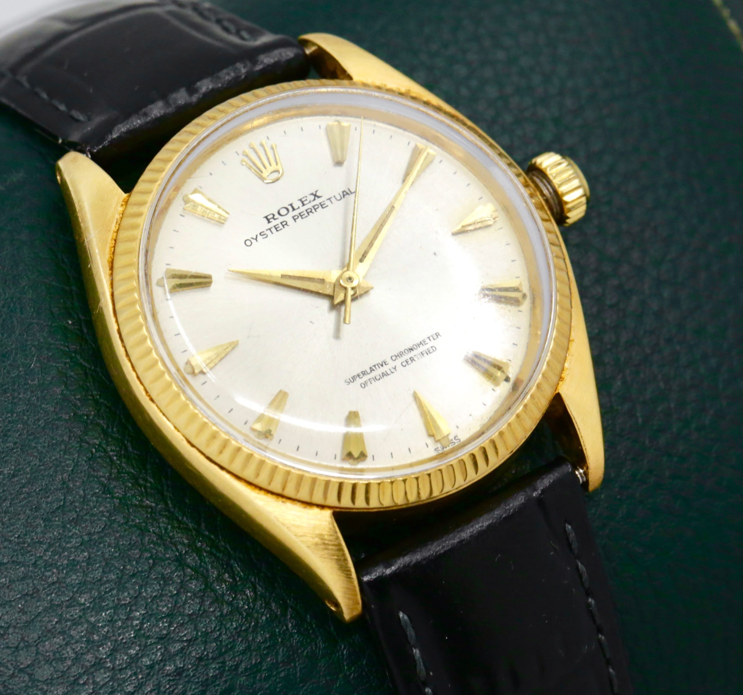 Rolex Oyster Perpetual in 18ct Yellow Gold , 18ct Fluted Bezel, Silver Index Dial, Rolex Calibre 1560, on a Black Leather Strap with a Rolex Gold Buckle. Ref: 1005, Ca. 1960's - $5,500 inc GST - *Sold as traded - Image 2
