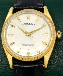 Rolex Oyster Perpetual in 18ct Yellow Gold , 18ct Fluted Bezel, Silver Index Dial, Rolex Calibre 1560, on a Black Leather Strap with a Rolex Gold Buckle. Ref: 1005, Ca. 1960's - $5,500 inc GST - *Sold as traded